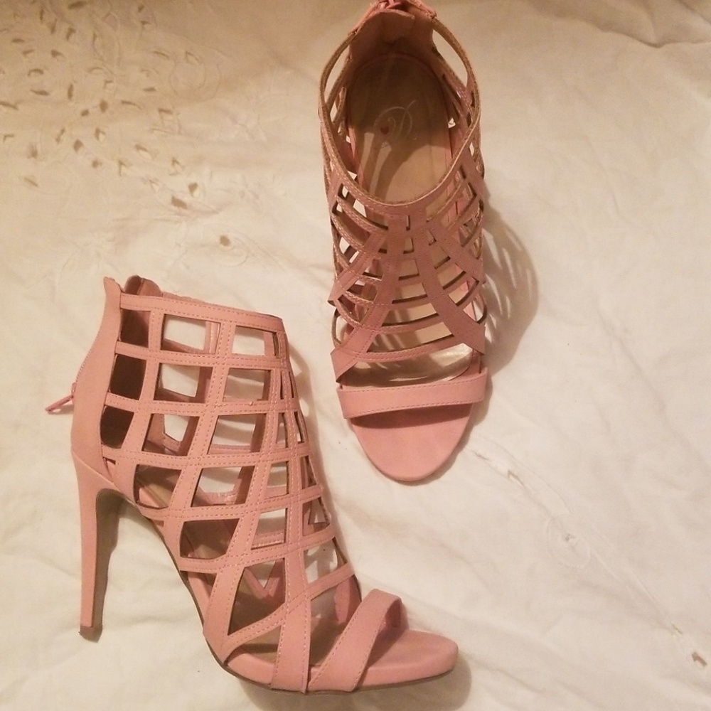 Caged strappy sexy pink heels.